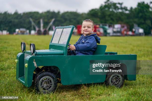 Stuart Coglan from Bishop Auckland drives his battery powered model Land Rover across the show ground at the Great Yorkshire Steam and Vintage Rally...