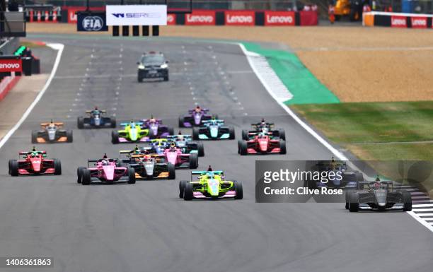 Jamie Chadwick of Great Britain and Jenner Racing leads the field into turn one at the start during the W Series Round 3 race at Silverstone on July...