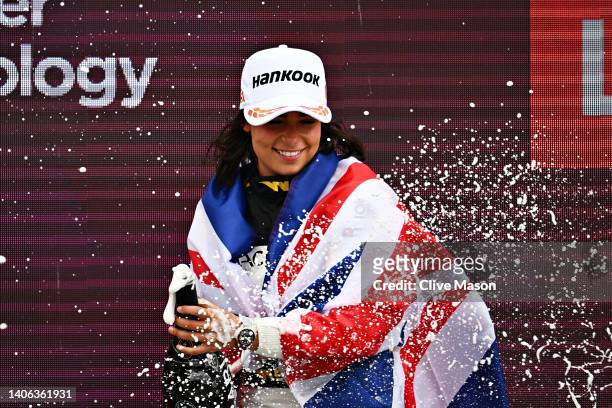 Race winner Jamie Chadwick of Great Britain and Jenner Racing celebrates on the podium during the W Series Round 3 race at Silverstone on July 02,...