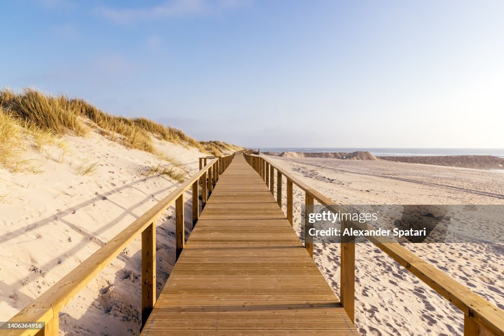 Boardwalk footpath along the ocean in Costa Nova, Aveiro, Portugal