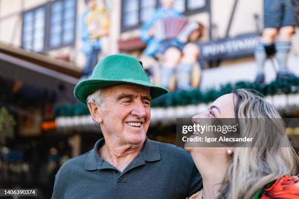 father and daughter in blumenau - offspring culture tourism festival stock pictures, royalty-free photos & images