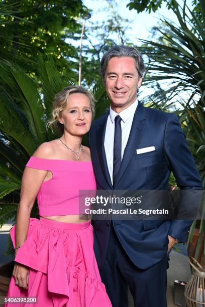 Caroline Roux and Laurent Solly attend the "Ondes Et Merveilles De Chaumet - New High Jewellery Collection" : photocall at Piscine Molitor on July...