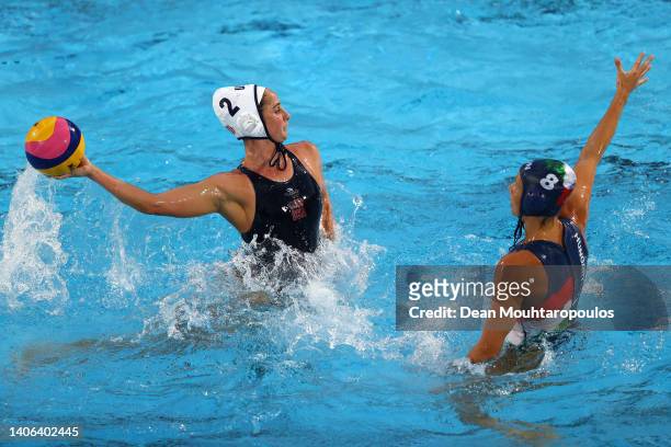 Madeline Musselman of Team United States shoots the ball against Rita Keszthelyi of Team Hungary during the Women's Water Polo Gold medal match...