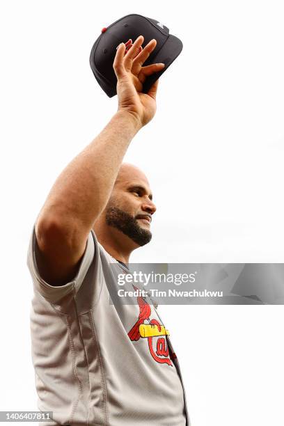 Albert Pujols of the St. Louis Cardinals is honored before a game between the St. Louis Cardinals and Philadelphia Phillies at Citizens Bank Park on...