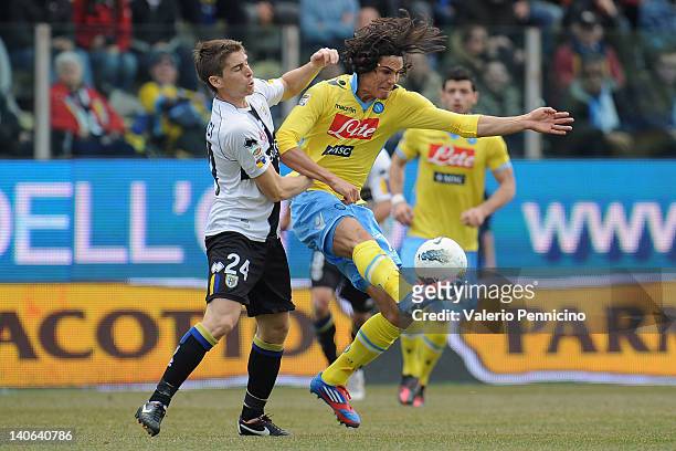 Gianluca Musacci of Parma FC competes with Edinson Roberto Cavani Gomez of SSC Napoli during the Serie A match between Parma FC and SSC Napoli at...
