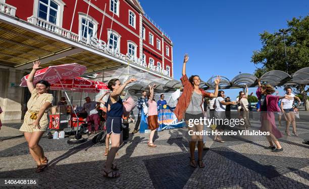 Demonstrators stage a flashmob in Santa Apolonia train station to demand the comeback of night train services to Madrid, Spain, and Hendaye, France,...