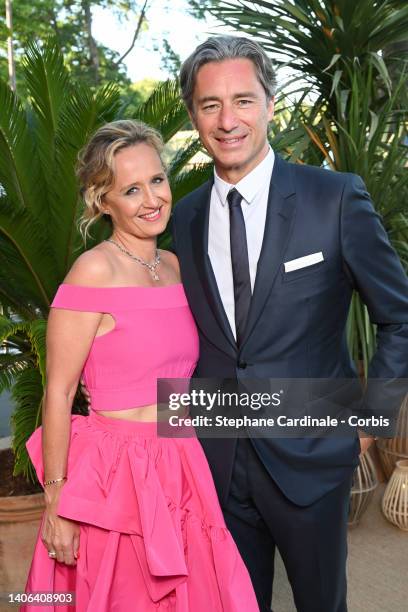 Caroline Roux and Laurent Solly attend the "Ondes Et Merveilles De Chaumet - New High Jewellery Collection" : photocall at Piscine Molitor on July...