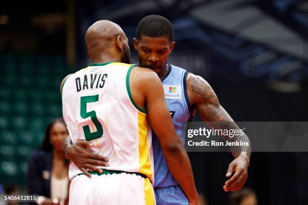 Joe Johnson of the Triplets hugs Stacy Davis of the Ball Hogs after the 50-48 loss against the Ball Hogs in BIG3 Week Three at Comerica Center on...