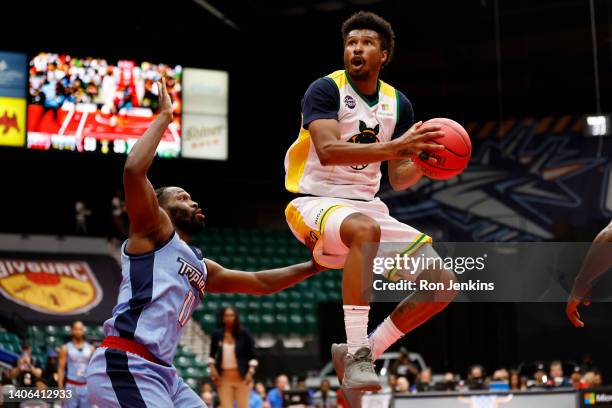 Leandro Barbosa of the Ball Hogs drives to the basket against Jeremy Pargo of the Triplets during the game in BIG3 Week Three at Comerica Center on...