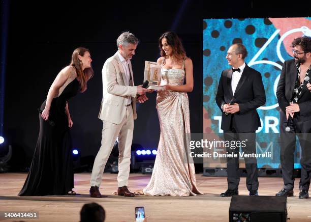 Hester Ruoff, Bart Ruspoli, Madalina Ghenea, a guest and Marco Borromei are seen on stage during the Taormina Film Fest 2022 on July 02, 2022 in...