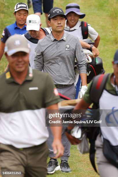 Team Captain Hideto Tanihara of Torque GC, Yuki Inamori of Torque GC and Team Captain Kevin Na of Iron Heads GC walk off the 17th tee during day...