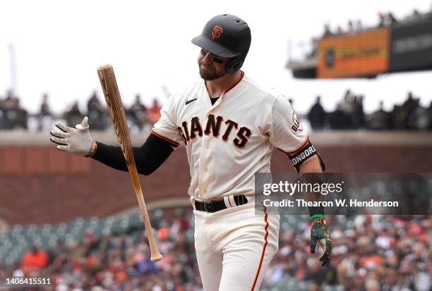 Evan Longoria of the San Francisco Giants reacts after he strikes out swinging against the Chicago White Sox in the bottom of the first inning at...