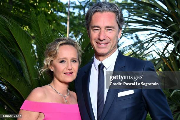 Caroline Roux and Laurent Solly attend the "Ondes Et Merveilles De Chaumet - New High Jewellery Collection" : photocall at Piscine Molitor on July...