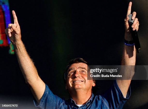 President of Brazil Jair Bolsonaro reacts as he attend a music festival organized by a local evangelic radio station on July 02, 2022 in Rio de...