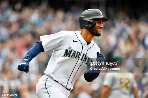 Abraham Toro of the Seattle Mariners hits the game winning RBI single during the ninth inning against the Oakland Athletics at T-Mobile Park on July...