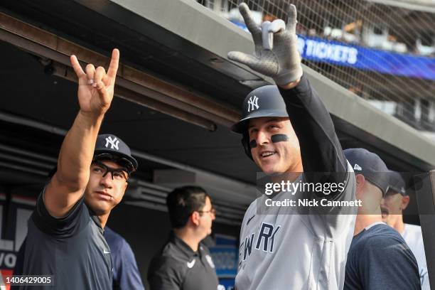 Anthony Rizzo and Gleyber Torres of the New York Yankees celebrate a solo home run by Rizzo off Aaron Civale of the Cleveland Guardians during the...