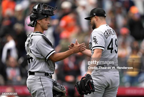 Seby Zavala and Kendall Graveman of the Chicago White Sox celebrate defeating the San Francisco Giants 5-3 at Oracle Park on July 02, 2022 in San...