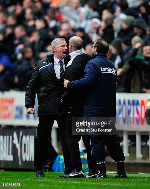 Sunderland manager Martin O' Neill is kept apart from Newcastle mananger Alan Pardew by 4th official Lee Mason during the Barclays Premier League...