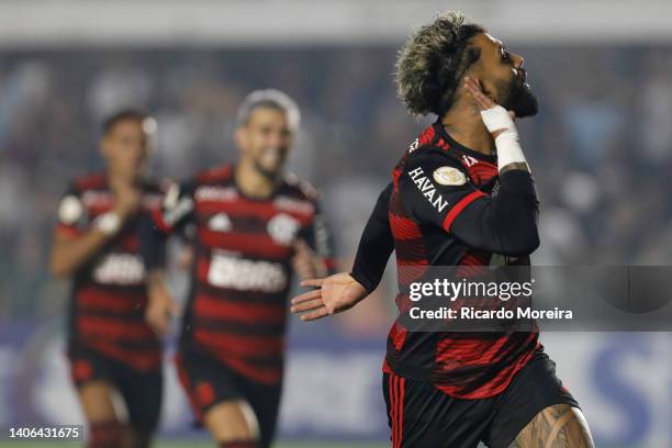 Gabriel Barbosa of Flamengo celebrate after scoring the second goal of his team during the match between Santos and Flamengo as part of Brasileirao...