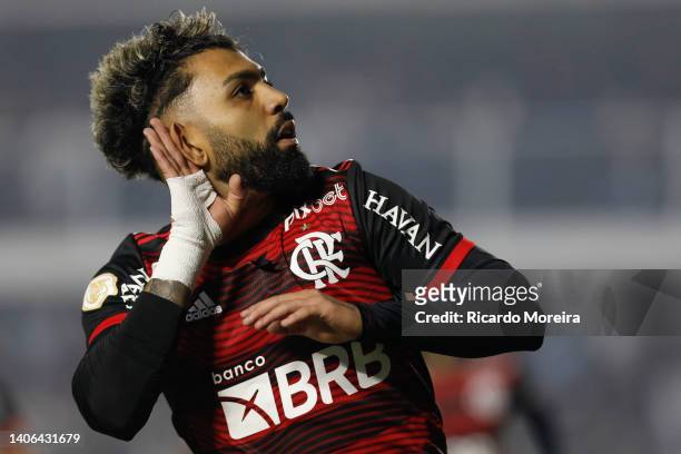 Gabriel Barbosa of Flamengo celebrate after scoring the second goal of his team during the match between Santos and Flamengo as part of Brasileirao...