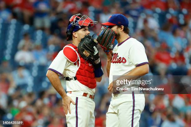 Realmuto and Brad Hand of the Philadelphia Phillies speak during the eighth inning against the St. Louis Cardinals at Citizens Bank Park on July 02,...