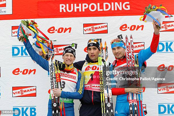 Martin Fourcade of France takes 1st place, Carl Johan Bergman of Sweden takes 2nd place, Anton Shipulin of Russia takes 3rd place competes during the...