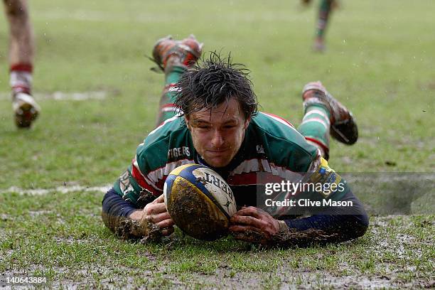 Matt Smith of Leicester Tigers breaks through to score a try during the Aviva Premiership match between Leicester Tigers and Gloucester at Welford...