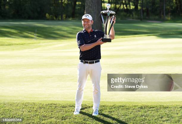 Branden Grace of South Africa poses with the the trophy after winning the LIV Golf Invitational - Portland at Pumpkin Ridge Golf Club on July 02,...