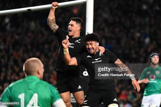 Ardie Savea celebrates with Quinn Tupaea after scoring a try during the International test Match in the series between the New Zealand All Blacks and...