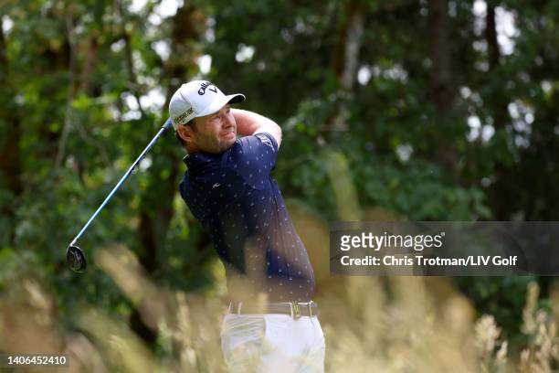 Branden Grace of Stinger GC plays his shot from the fourth tee during day three of the LIV Golf Invitational - Portland at Pumpkin Ridge Golf Club on...