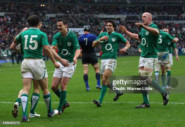 Tommy Bowe of Ireland is congratulated by his team mates after scoring his second try during the RBS Six Nations match between France and Ireland at...