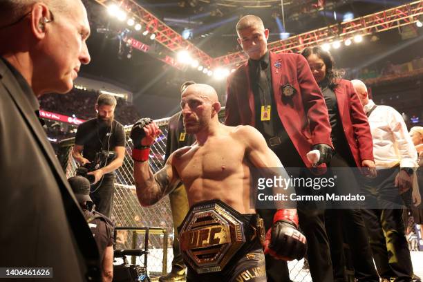 Alexander Volkanovski of Australia exits the octagon after his unanimous decision win over Max Holloway in their featherweight title bout during UFC...