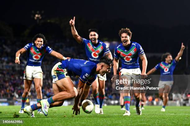 Jesse Arthars of the Warriors celebrates after scoring a try during the round 16 NRL match between the New Zealand Warriors and the Wests Tigers at...