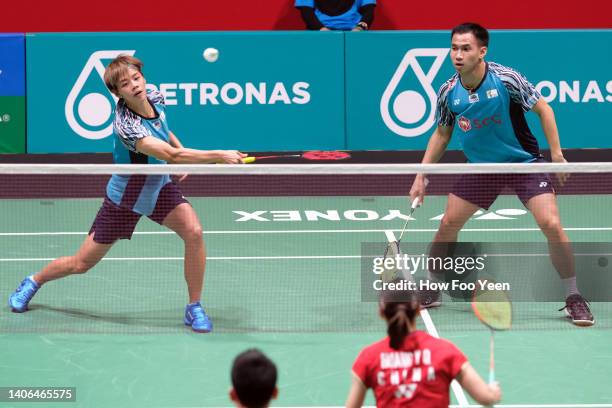 Dechapol Puavarananukroh and Sapsiree Taerattanaachai of Thailand in action against Zheng Si Wei and Huang Ya Qiona of China their mixed doubles...