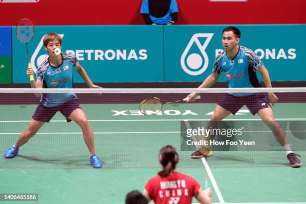 Dechapol Puavarananukroh and Sapsiree Taerattanaachai of Thailand in action against Zheng Si Wei and Huang Ya Qiona of China their mixed doubles...