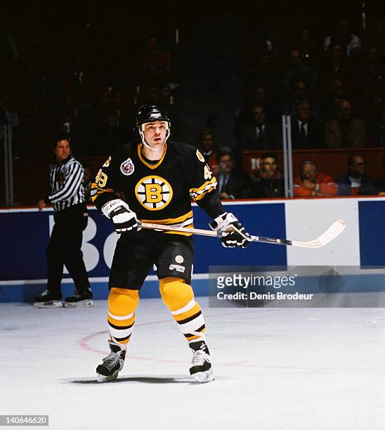 Joe Juneau of the Boston Bruins skates against the Montreal Canadiens Circa 1990 at the Montreal Forum in Montreal, Quebec, Canada.