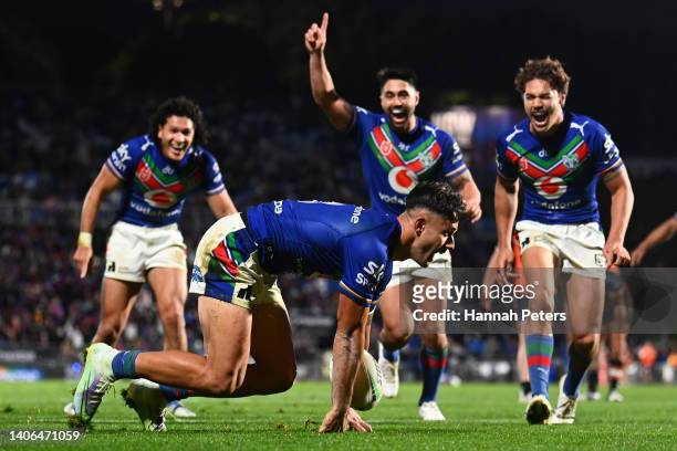 Jesse Arthars of the Warriors celebrates after scoring a try during the round 16 NRL match between the New Zealand Warriors and the Wests Tigers at...
