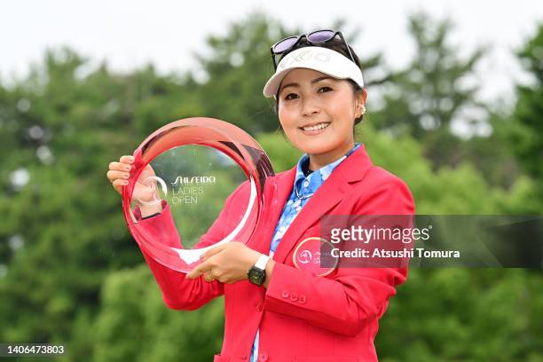 Serena Aoki of Japan poses with the trophy after winning the tournament following the final round of Shiseido Ladies Open at Totsuka Country Club on...