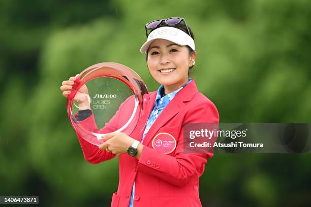 Serena Aoki of Japan poses with the trophy after winning the tournament following the final round of Shiseido Ladies Open at Totsuka Country Club on...