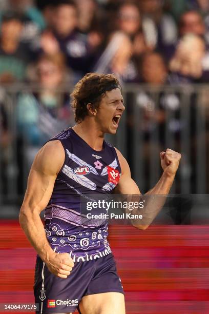 Nat Fyfe of the Dockers celebrates a goal during the round 16 AFL match between the Fremantle Dockers and the Port Adelaide Power at Optus Stadium on...
