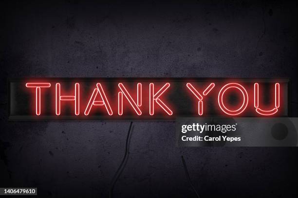 thank you word in neon style.black background - grazie foto e immagini stock