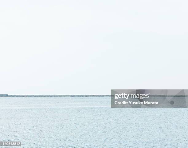 breakwater in the sea - região de hokuriku - fotografias e filmes do acervo