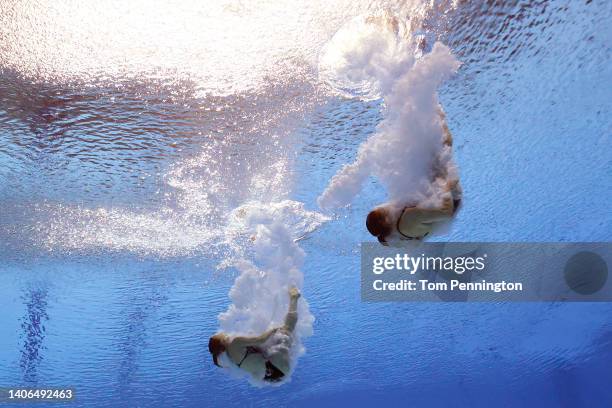 Lena Hentschel and Tina Punzel of Team Germany compete in the Women's Synchronized 3m Springboard Preliminaries on day eight of the Budapest 2022...