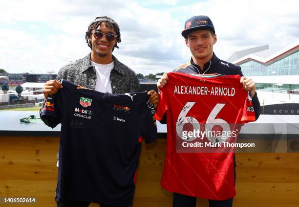 Max Verstappen of the Netherlands and Oracle Red Bull Racing meets Trent Alexander-Arnold prior to the F1 Grand Prix of Great Britain at Silverstone...