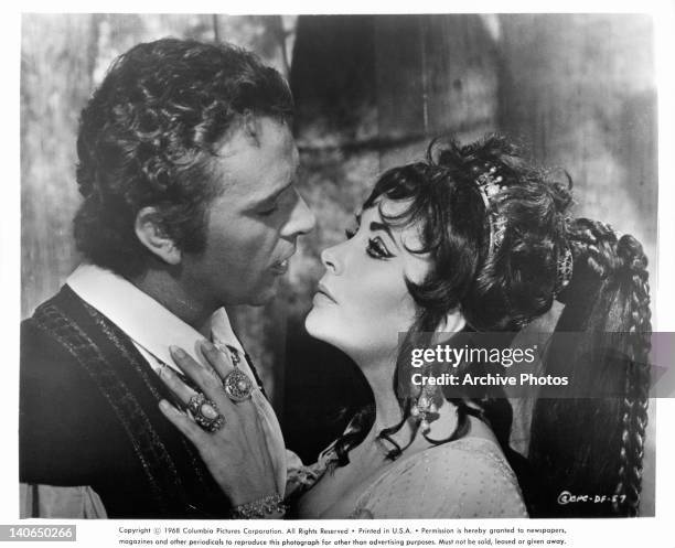 Richard Burton about to kiss Elizabeth Taylor in a scene from the film 'Doctor Faustus', 1967.