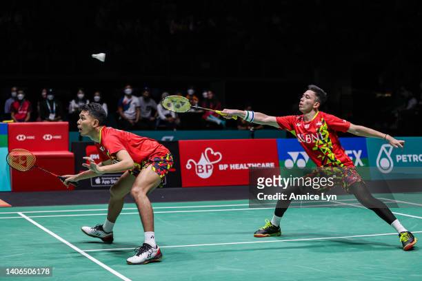 Muhammad Rian Ardianto and Fajar Alfian of Indonesia compete in the Men's Doubles Finals match against Takuro Hoki and Yugo Kobayashi of Japan on day...