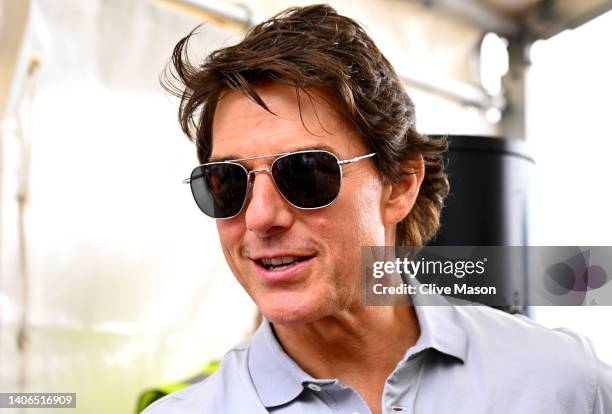 Tom Cruise walks in the Paddock prior to the F1 Grand Prix of Great Britain at Silverstone on July 03, 2022 in Northampton, England.