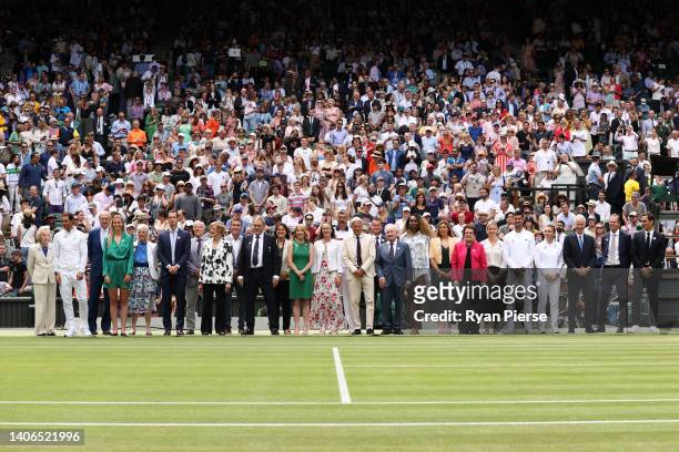 Former Wimbledon Champions pose for a photo at the Centre Court Centenary Celebration on day seven of The Championships Wimbledon 2022 at All England...