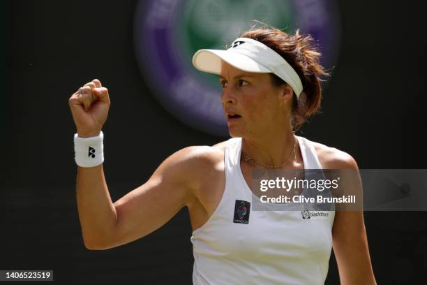 Tatjana Maria of Germany celebrates a point against Jelena Ostapenko of Latvia during their Women's Singles Fourth Round match on day seven of The...