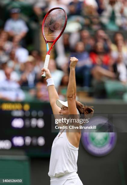 Tatjana Maria of Germany celebrates winning match point against Jelena Ostapenko of Latvia during their Women's Singles Fourth Round match on day...